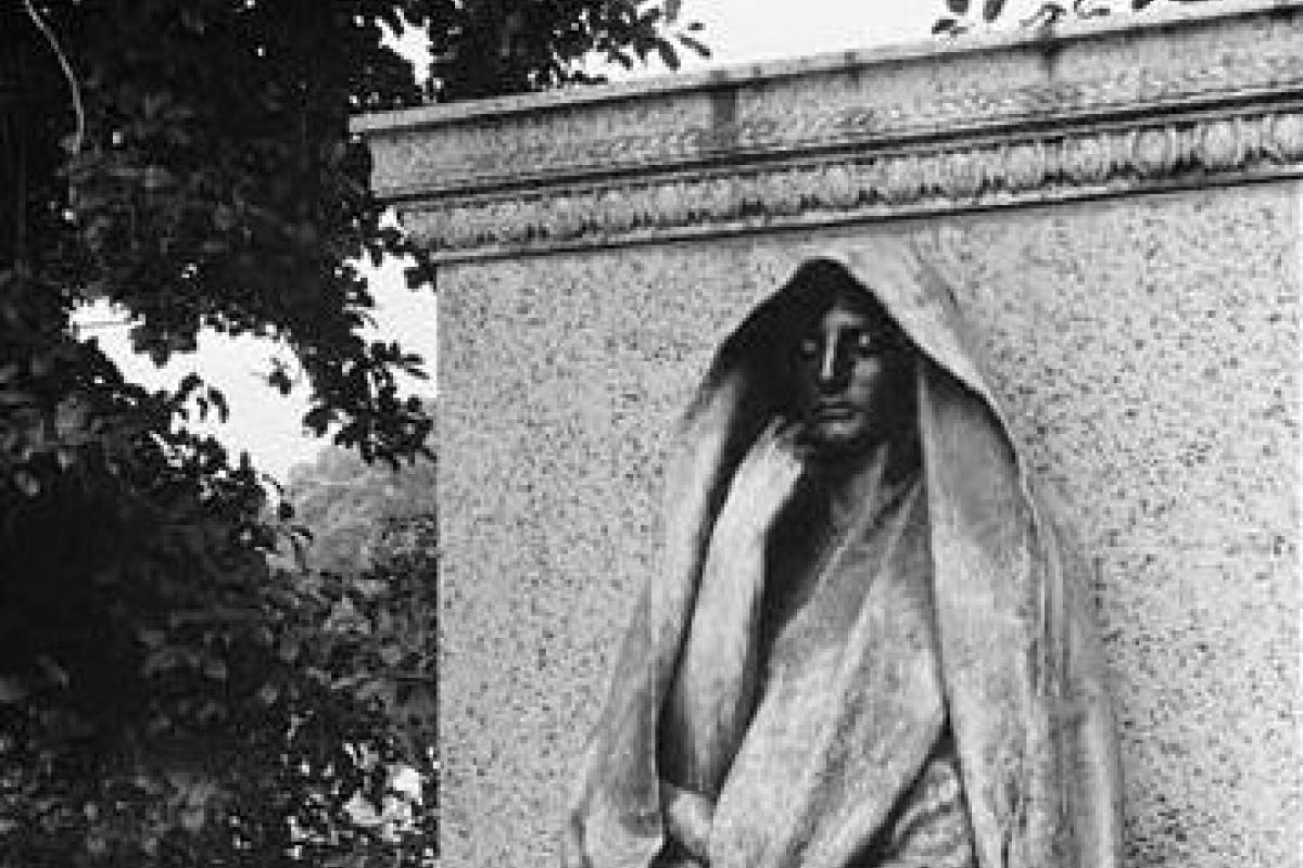Stone sculpture of a woman in a flowing wimple at Rock Creek
