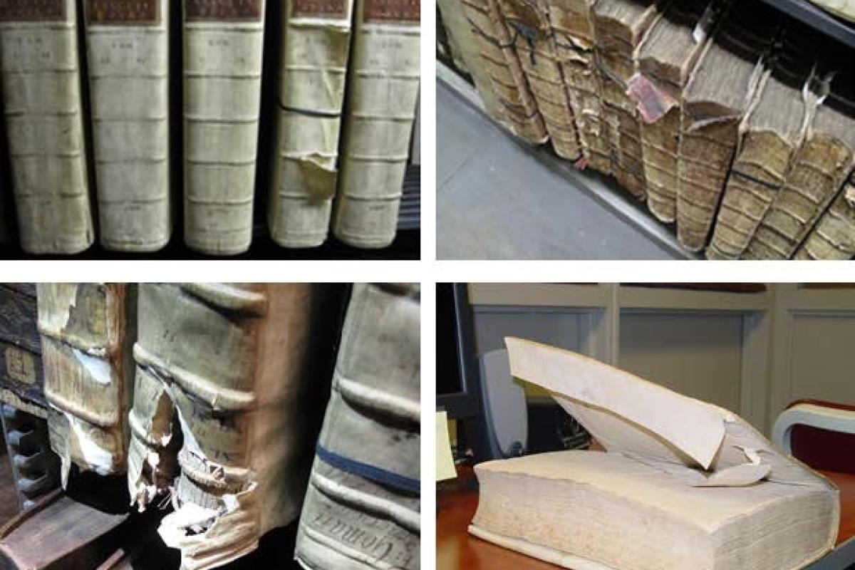 Antique books in various states of preservation.