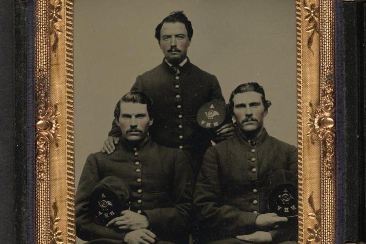 Photo portrait of three brothers from the Civil War in Union uniforms
