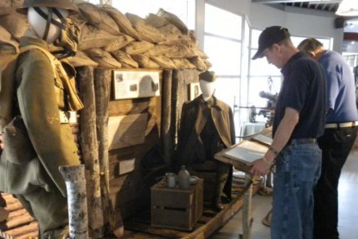Visitors looking at the Richard Bong Center's newest display