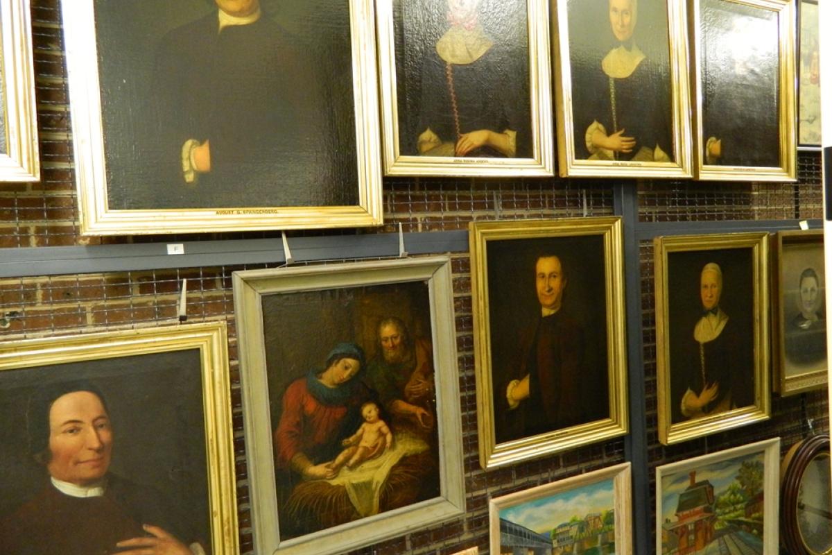 18th- and 19th-century paintings on a wall
