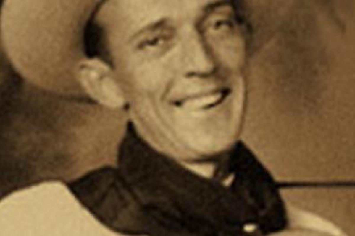 Sepia photograph of Jimmie Rodgers, a honky tonk musician