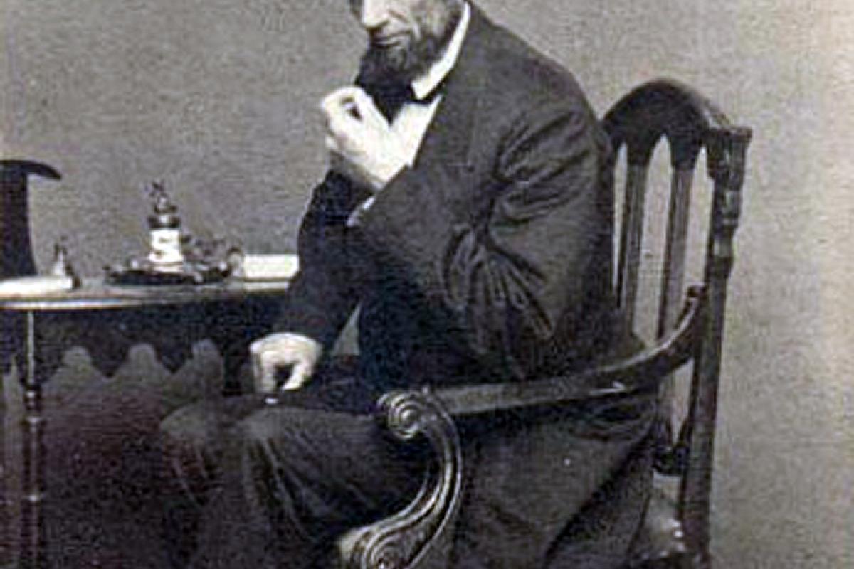 Photo of Lincoln seated by Matthew Brady