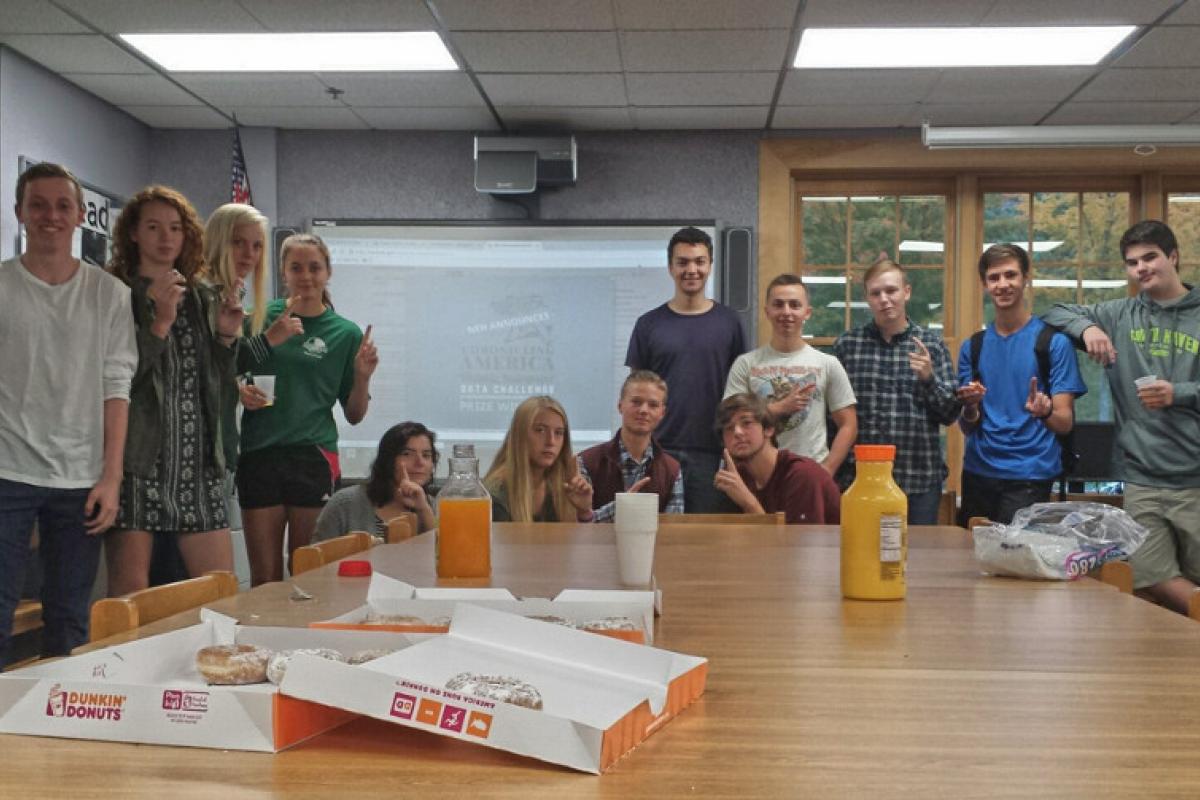 Students sitting around a table
