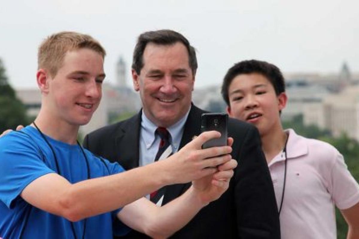 Senator Joe Donnelly of Indiana takes a selfie with Indiana National History Day
