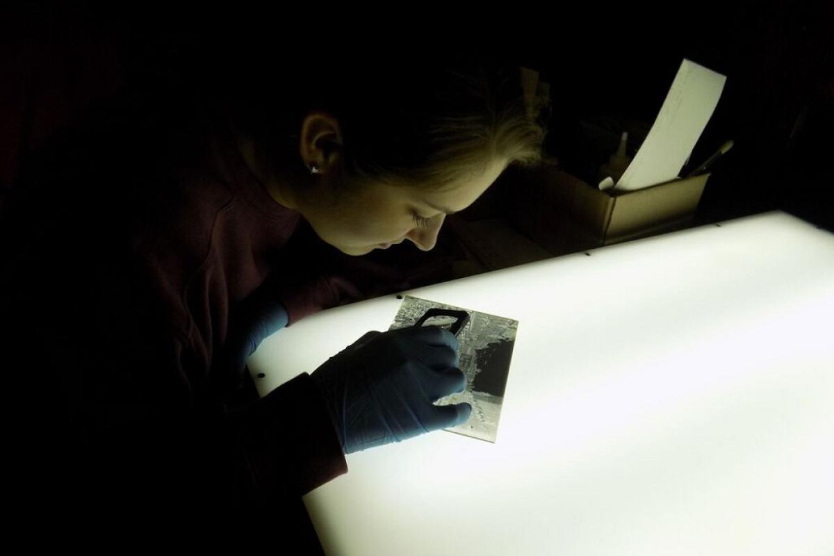 Woman looking at a photograph