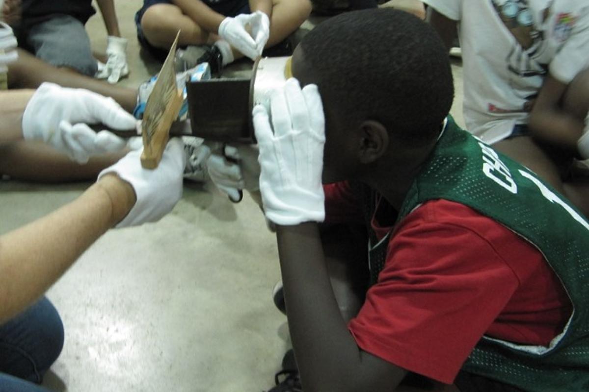 A boy with a stereoviewer