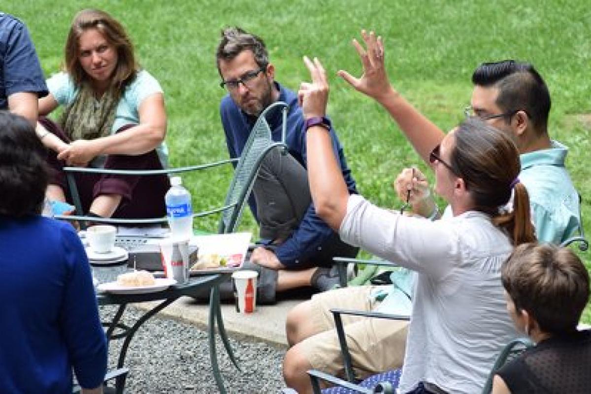 Participants engage in discussion
