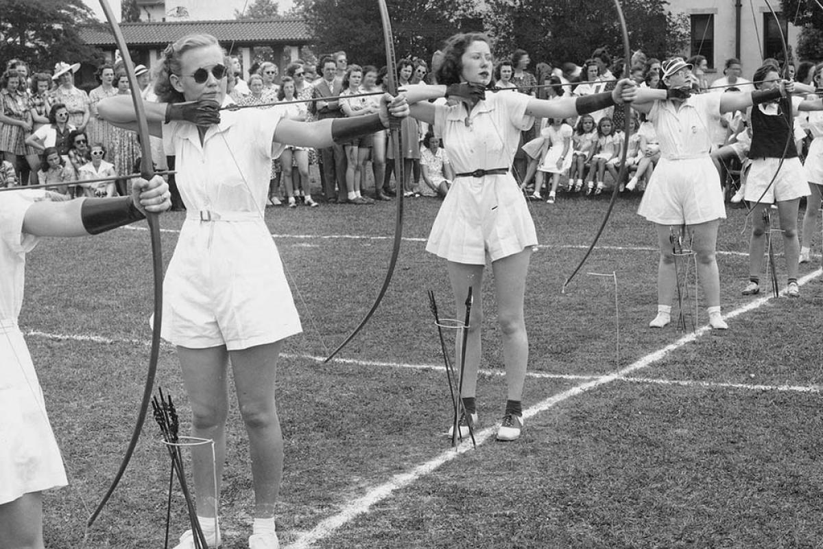 Girls playing archery