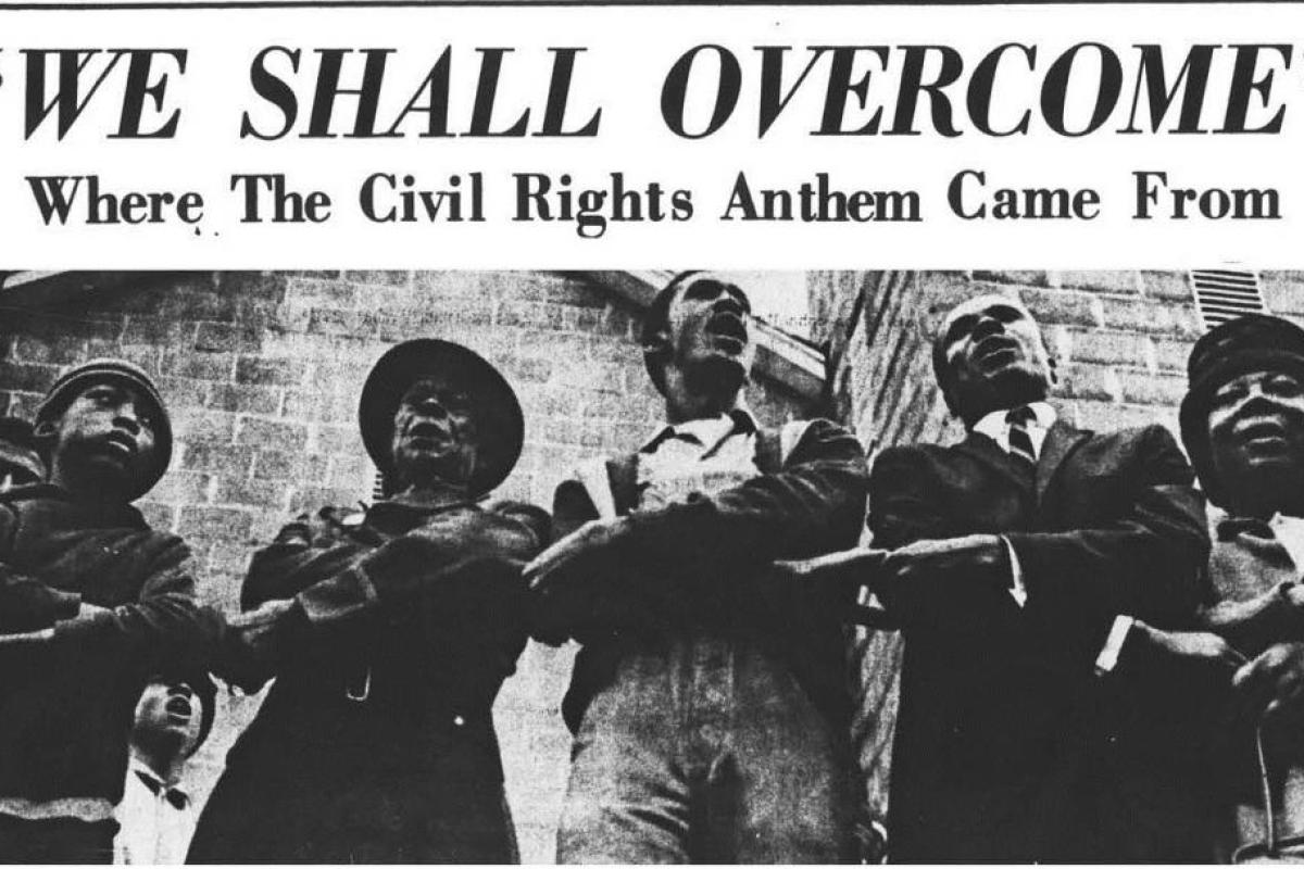African Americans linking arms and singing