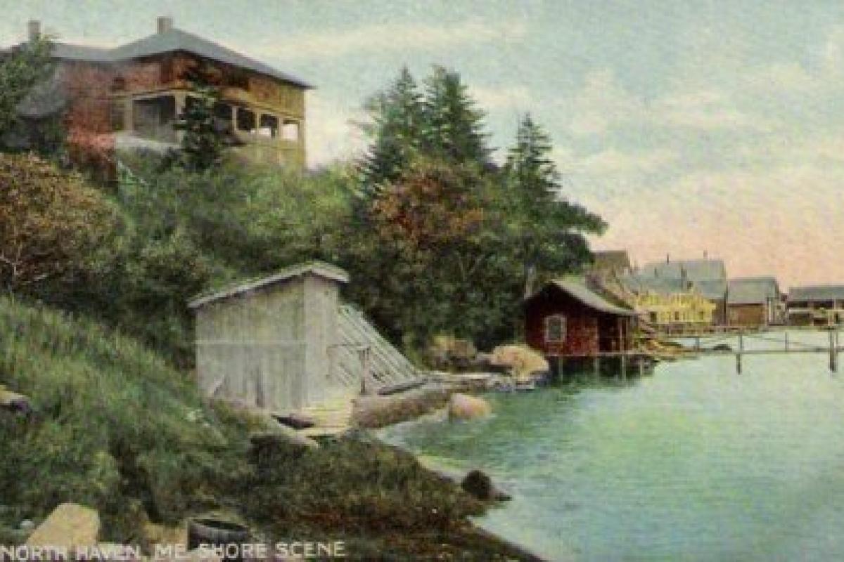 Painting of a waterfront scene with boathouses in the background and a house on a hill to the left.