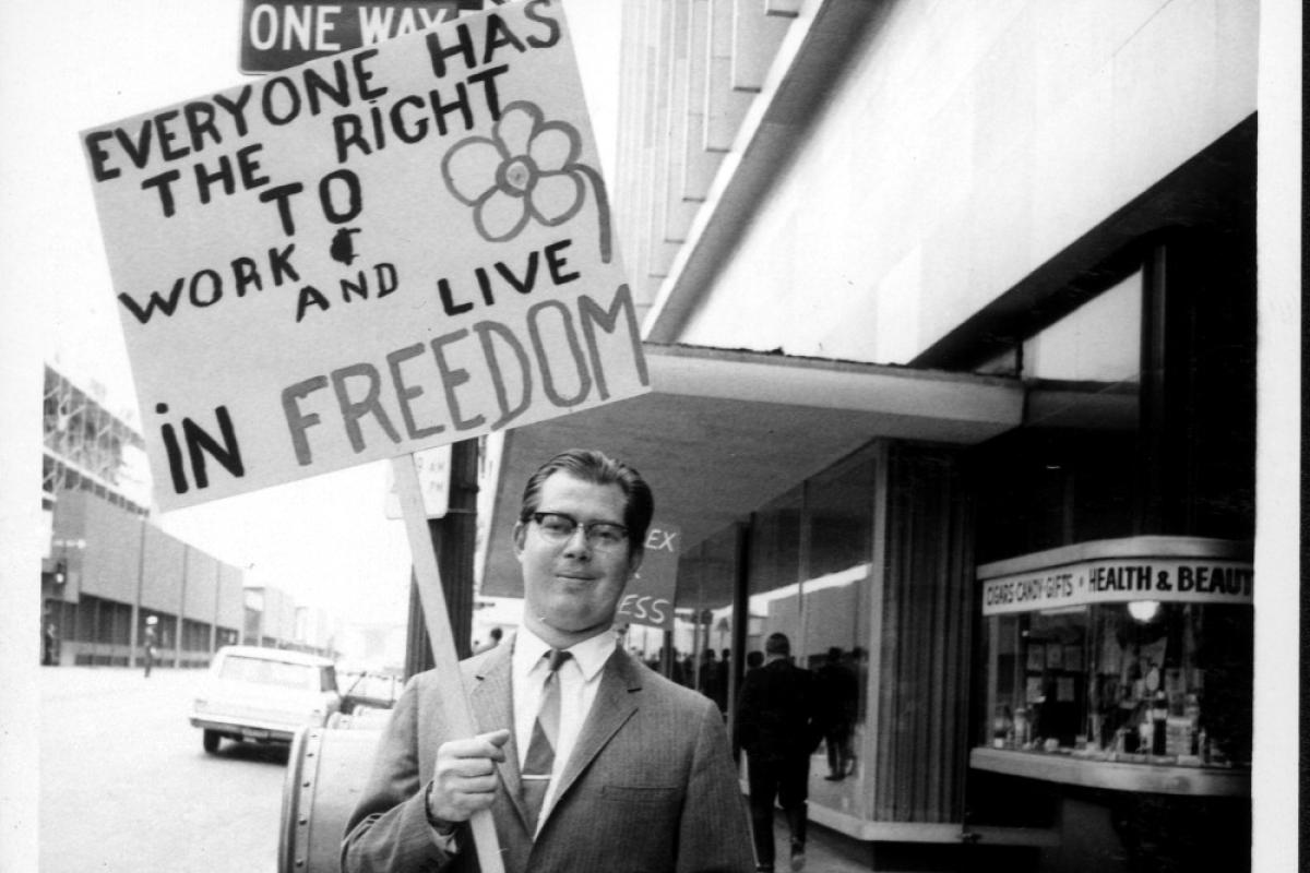 Demonstrator outside the State Steamship Lines, circa May 1969.