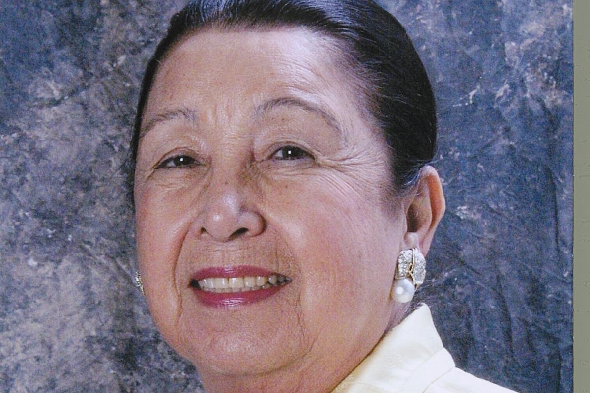 a portrait of Teresa Lozano Long smiling