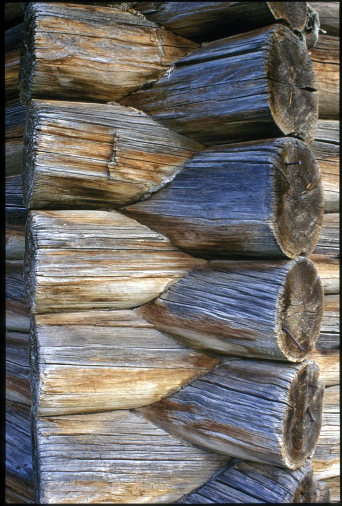 close up shot of logs interlocking on a church