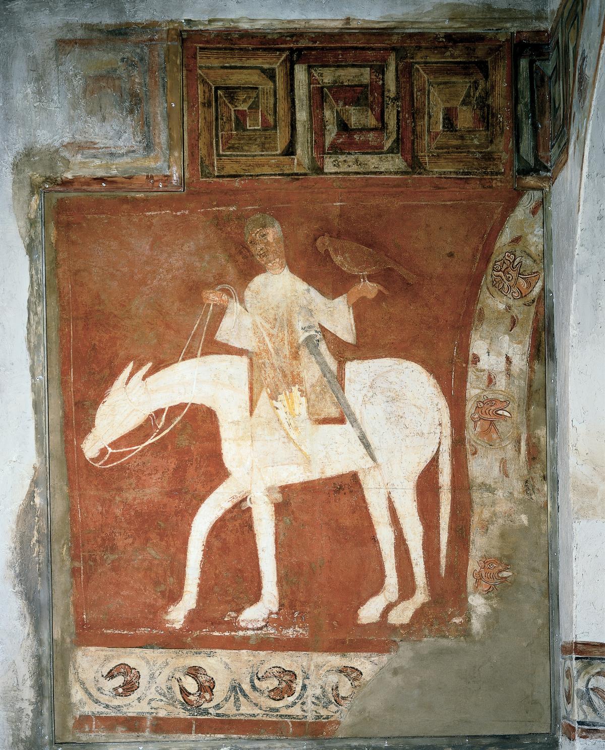 Falconer riding a white horse, with a brown falcon perched on his arm and a sword on his hip