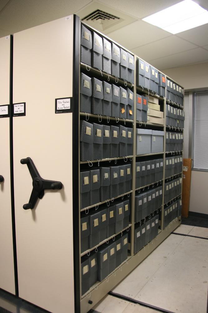 Shelving unit holding all of the newly rehoused and cataloged photographic mater