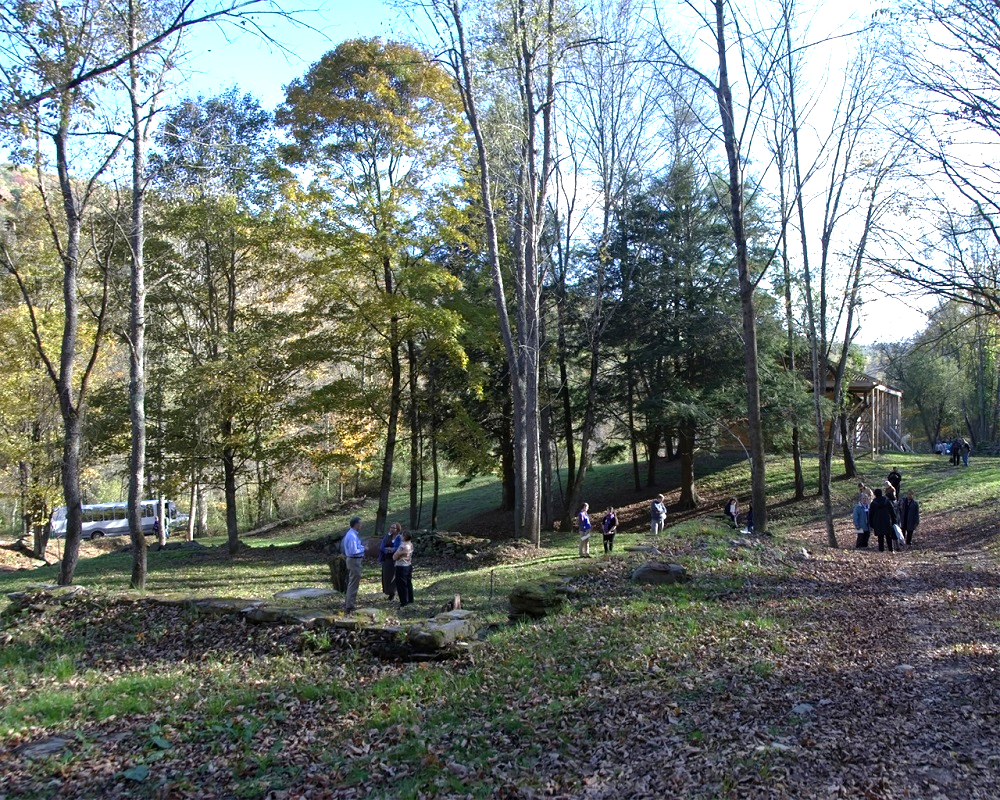 Visitors tour the grounds of Dennis Farm.