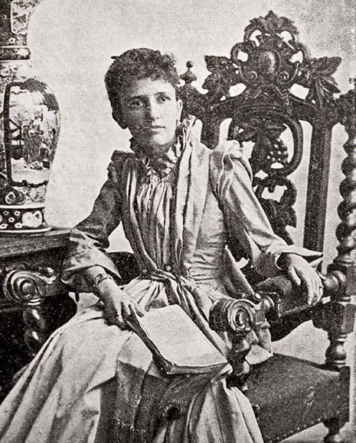 A young Helen Hamilton Gardener, seated