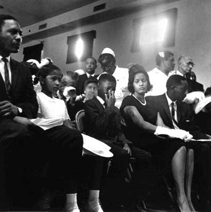 Myrlie Evers and family at the funeral of her husband, slain civil rights activist Medgar Evers, 1963.