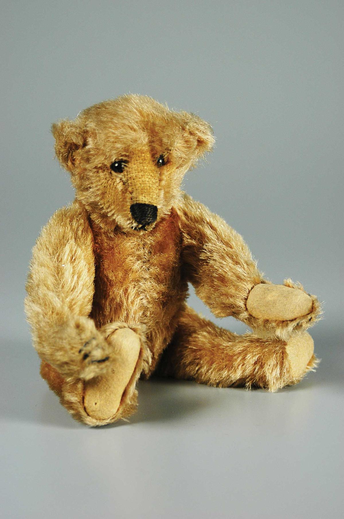 a stuffed brown teddy bear