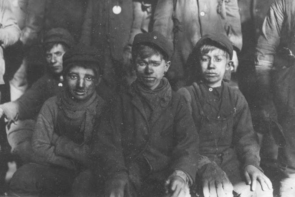 Lewis Hine, Group of Breaker boys. Smallest is Sam Belloma, Pine Street., Pittston, Pennsylvania, 1910. Gelatin silver print, 5 x 7 in.
