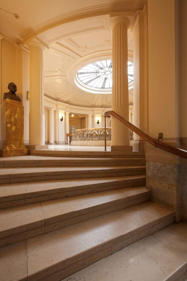 Interior photograph of the society’s headquarters from the steps looking toward the second floor.
