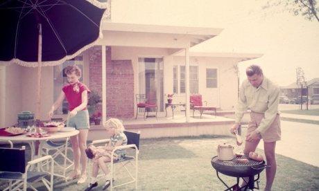 Family barbecue in Lakewood Plaza suburban development, Long Beach, California,