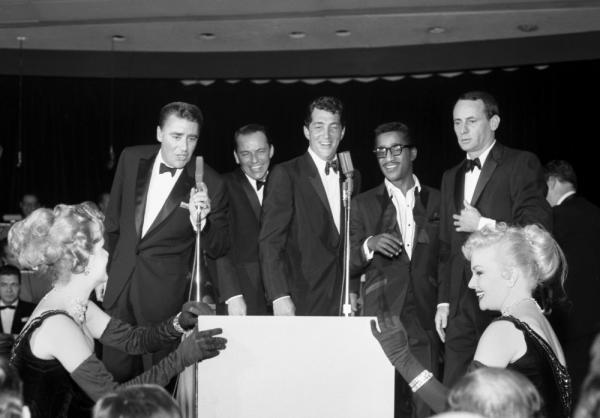 Peter Lawford, Frank Sinatra, Dean Martin, Sammy Davis Jr. and Joey Bishop perform