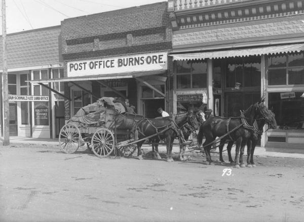 Horse and carriage in front of post office