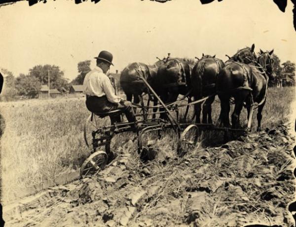Man plowing a field in Colorado