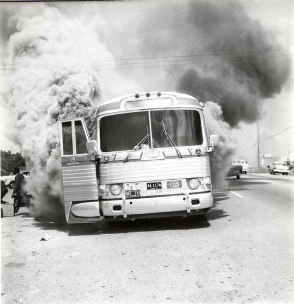 photo: firebombed Freedom Ride bus in Annison, Alabama, May 14, 1961