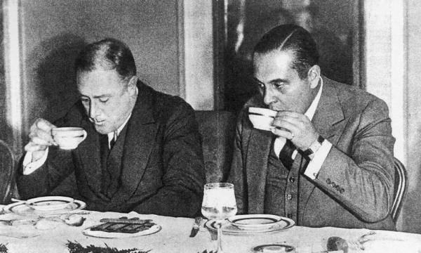 Generoso Pope (right), an Italian-American businessman and newspaper publisher, and future president Franklin D. Roosevelt.
