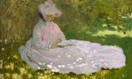 Monet painting: seated woman, reading in spring garden
