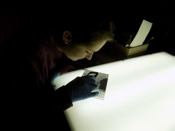 Woman looking at a photograph