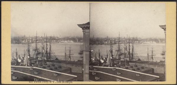 Black and white photo of Fulton Ferry, looking over port of boats