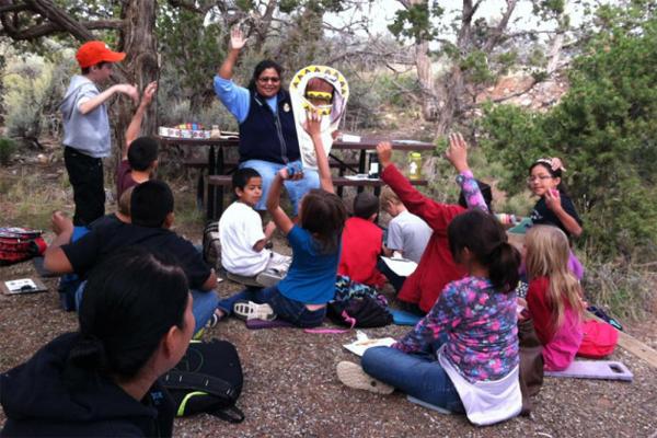 Students learning about Ute cultural artifacts.