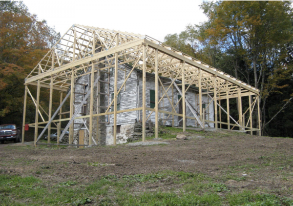 View of protective roof framing on the Dennis House during the 2013 stabilization project