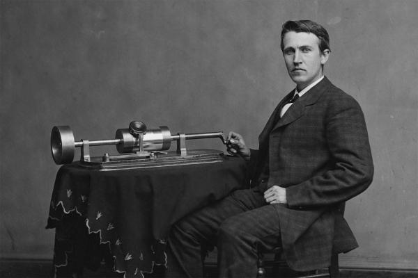 Thomas Edison with phonograph, 1870s.