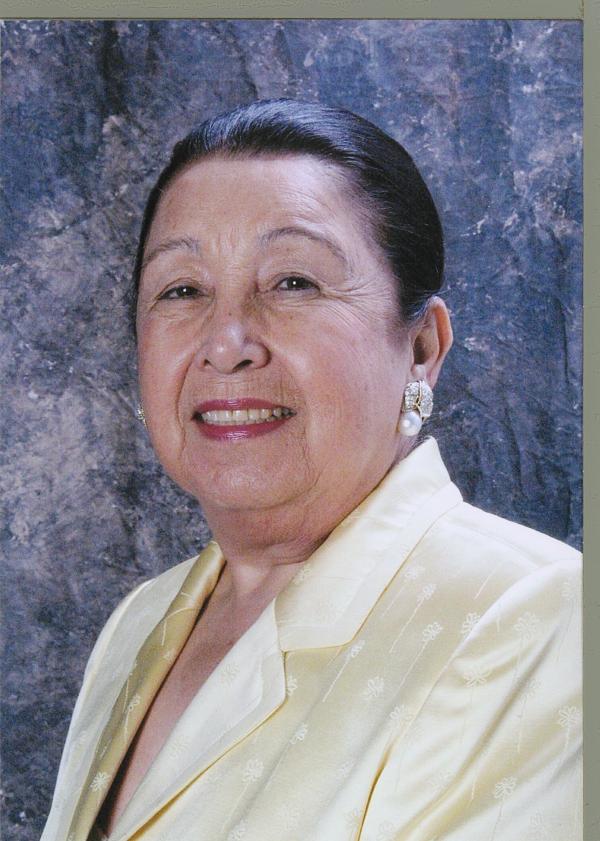 a portrait of Teresa Lozano Long smiling