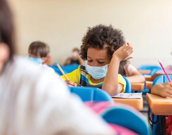 Student wearing mask in classroom