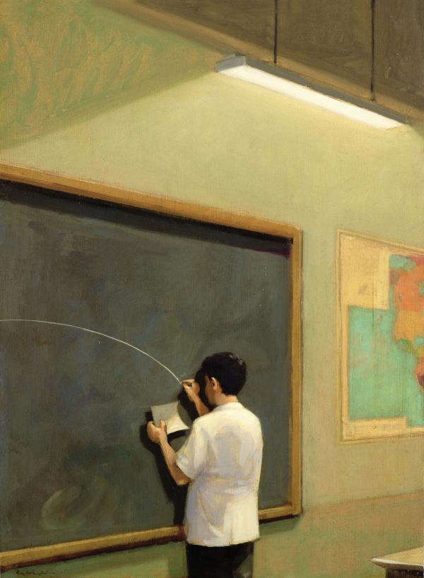 Teacher standing in front of chalkboard