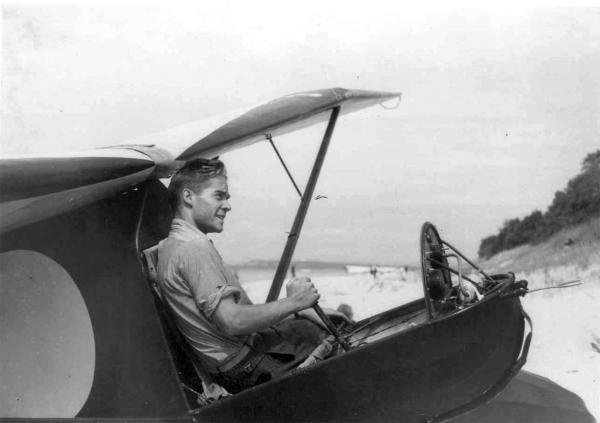 Noyes sitting in a glider plane