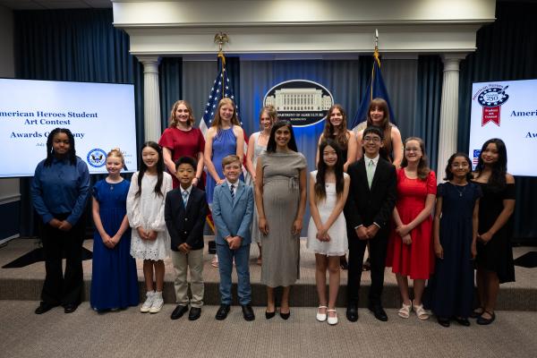 Usha Vance with regional and national winners of American Heroes Student Art Contest