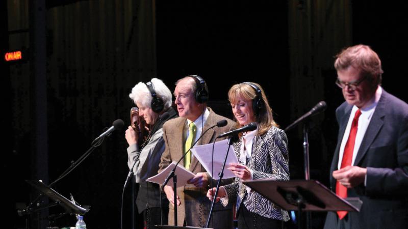 Photo of Garrison Keillor along with fellow voice actors.
