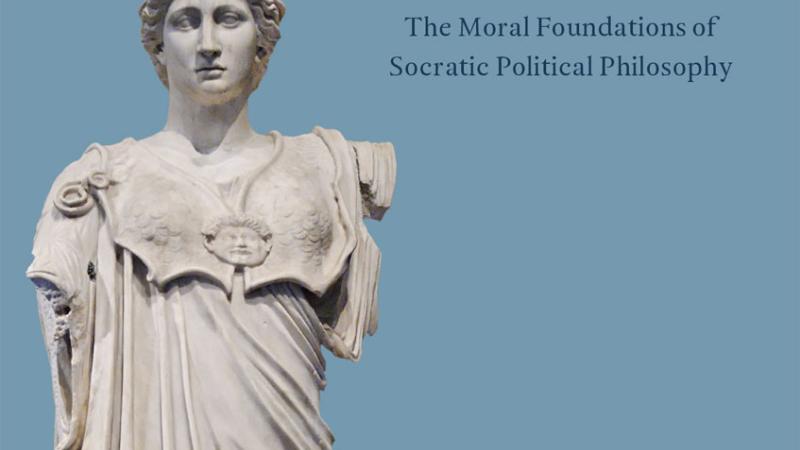 Blue book cover with a classical-looking statue printed on it.