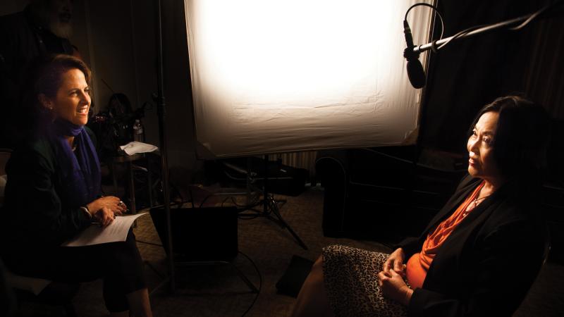 Lynn Novick interviewing Duong Van Mai Elliott in a darkened room
