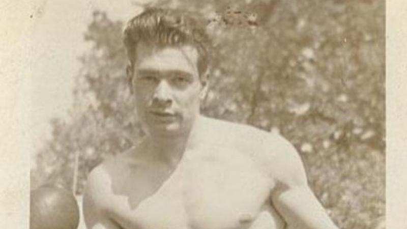 A sepia-colored photograph of Hank Kaplan
