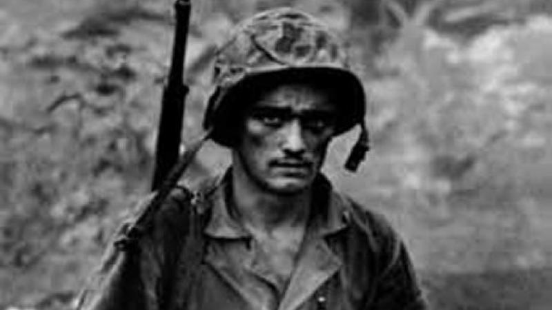 Black and white photograph of a US soldier during WWII