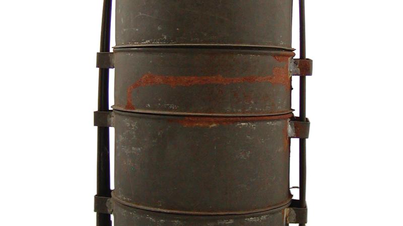 A cylindrical can with a long handle