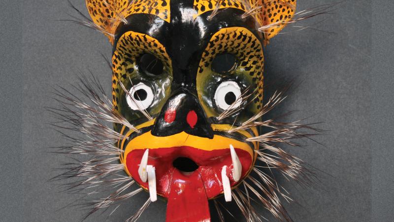 Photograph of a wooden mask, colorful